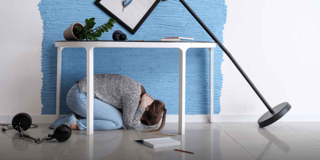 woman-hiding-under-table